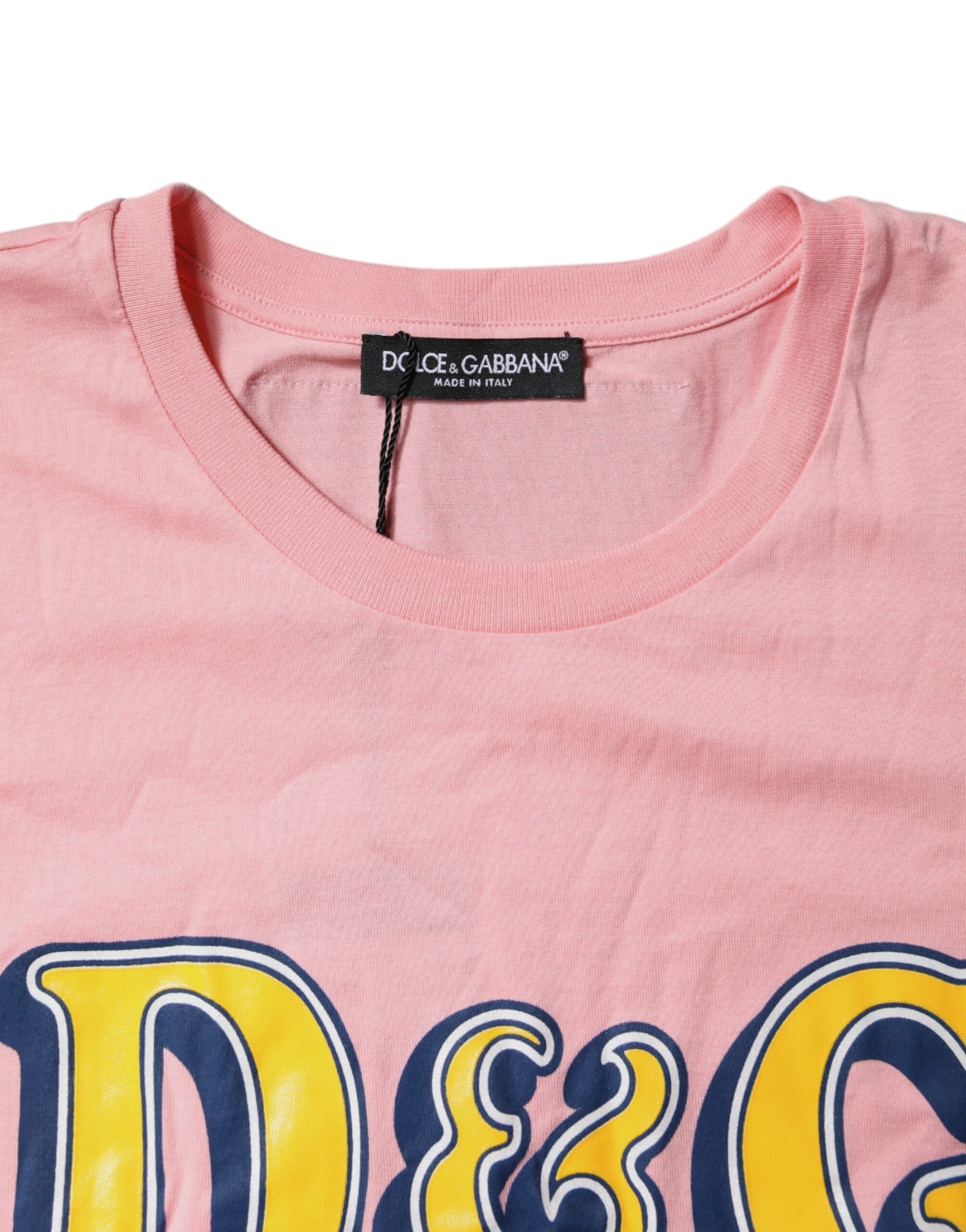 Pink t-shirt with yellow letters