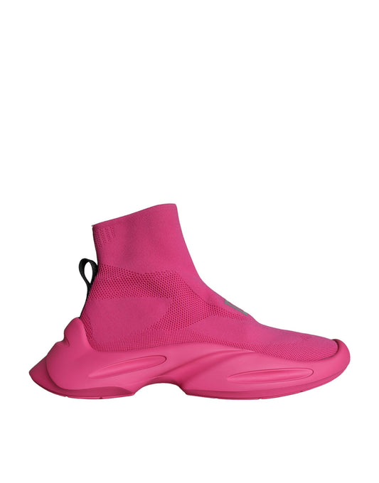 Pink shoe with black laces and a black strap
