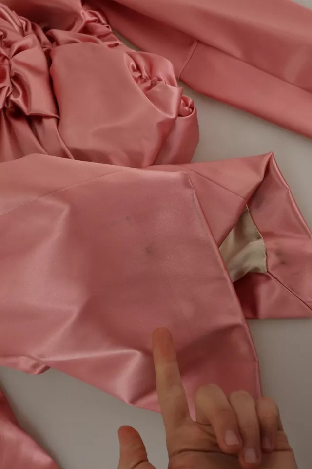 A pink bodycon sheath midi dress with long sleeves, from the brand Dolce & Gabbana