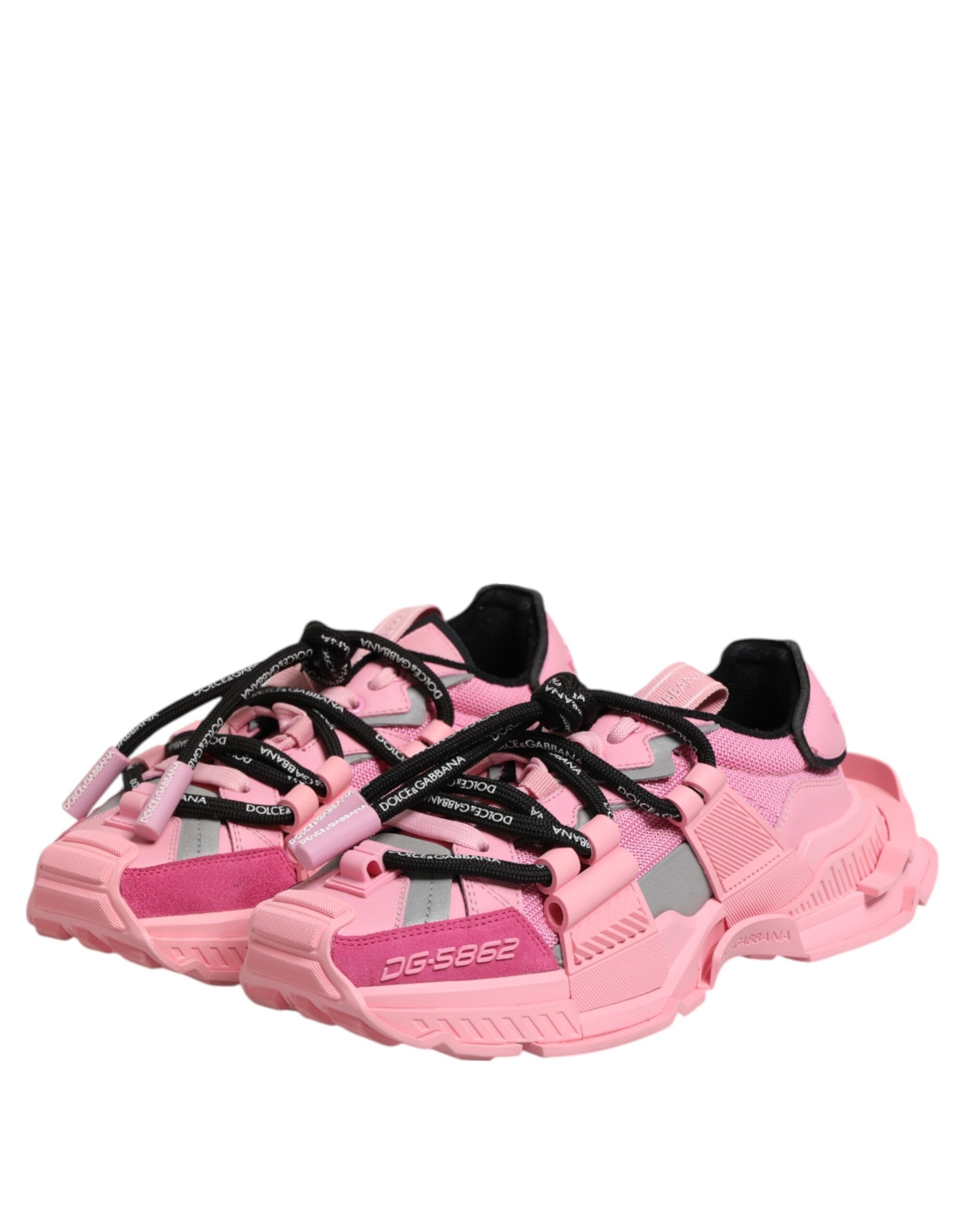 Pair of pink women's sneakers with black laces and a logo on the side
