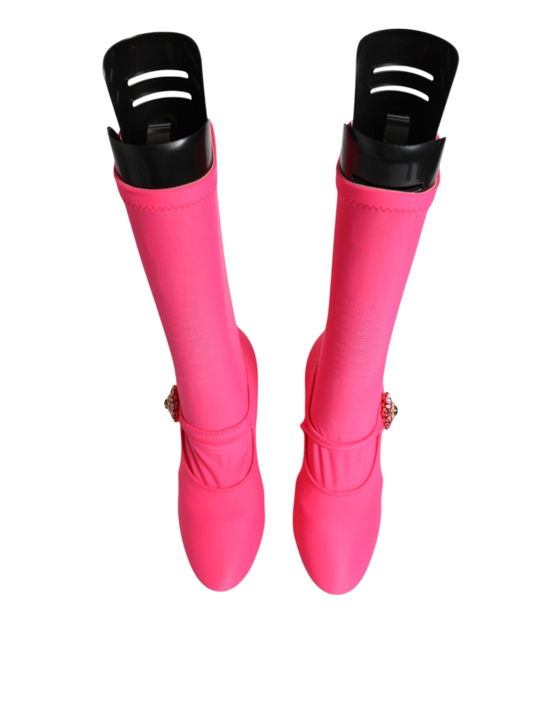 Pair of pink knee high boots