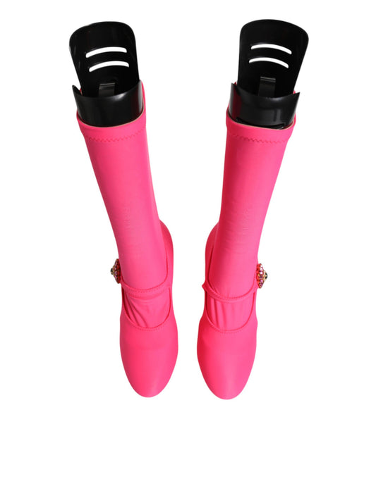 Pair of pink knee high boots