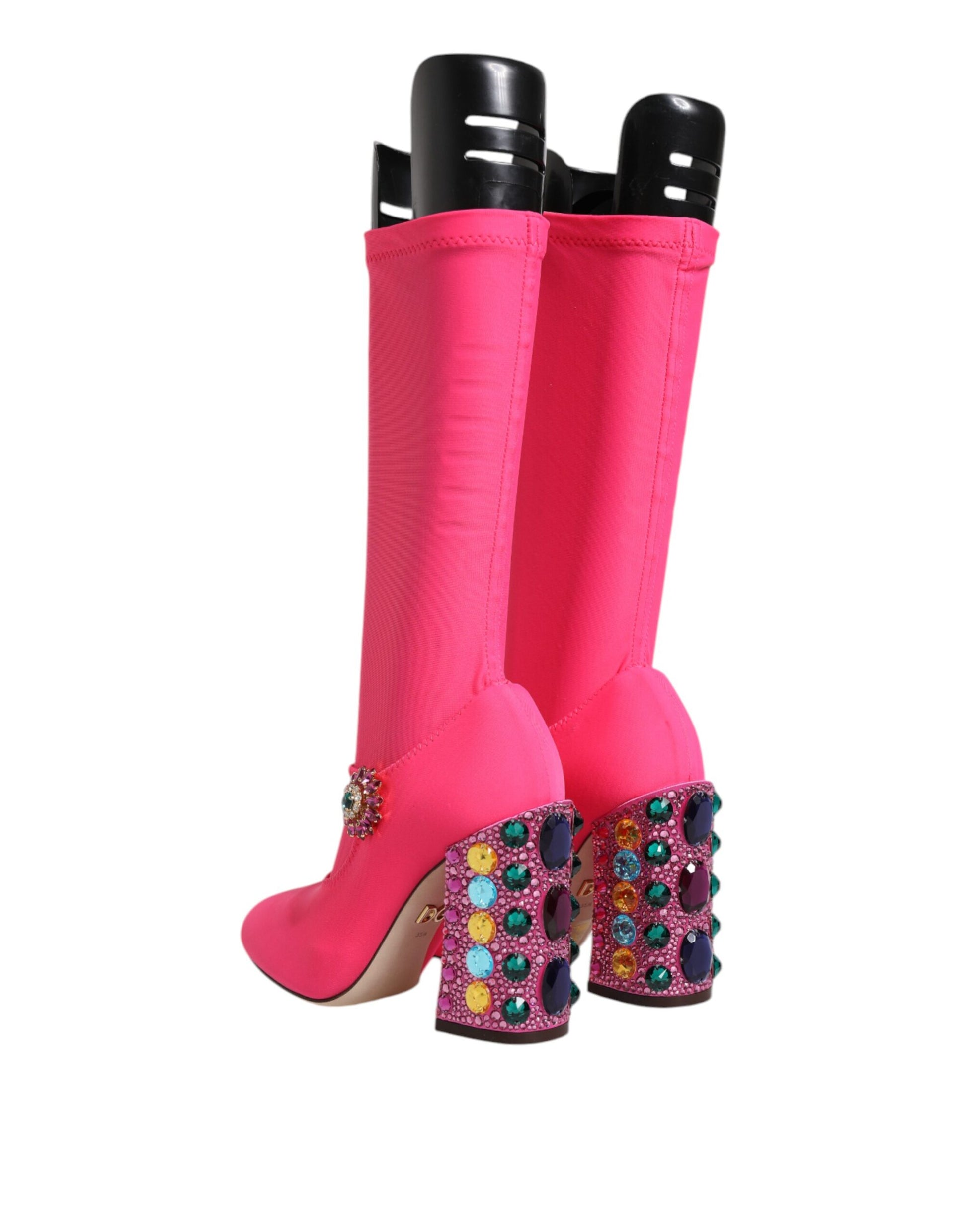 Pair of pink boots with glittery heels