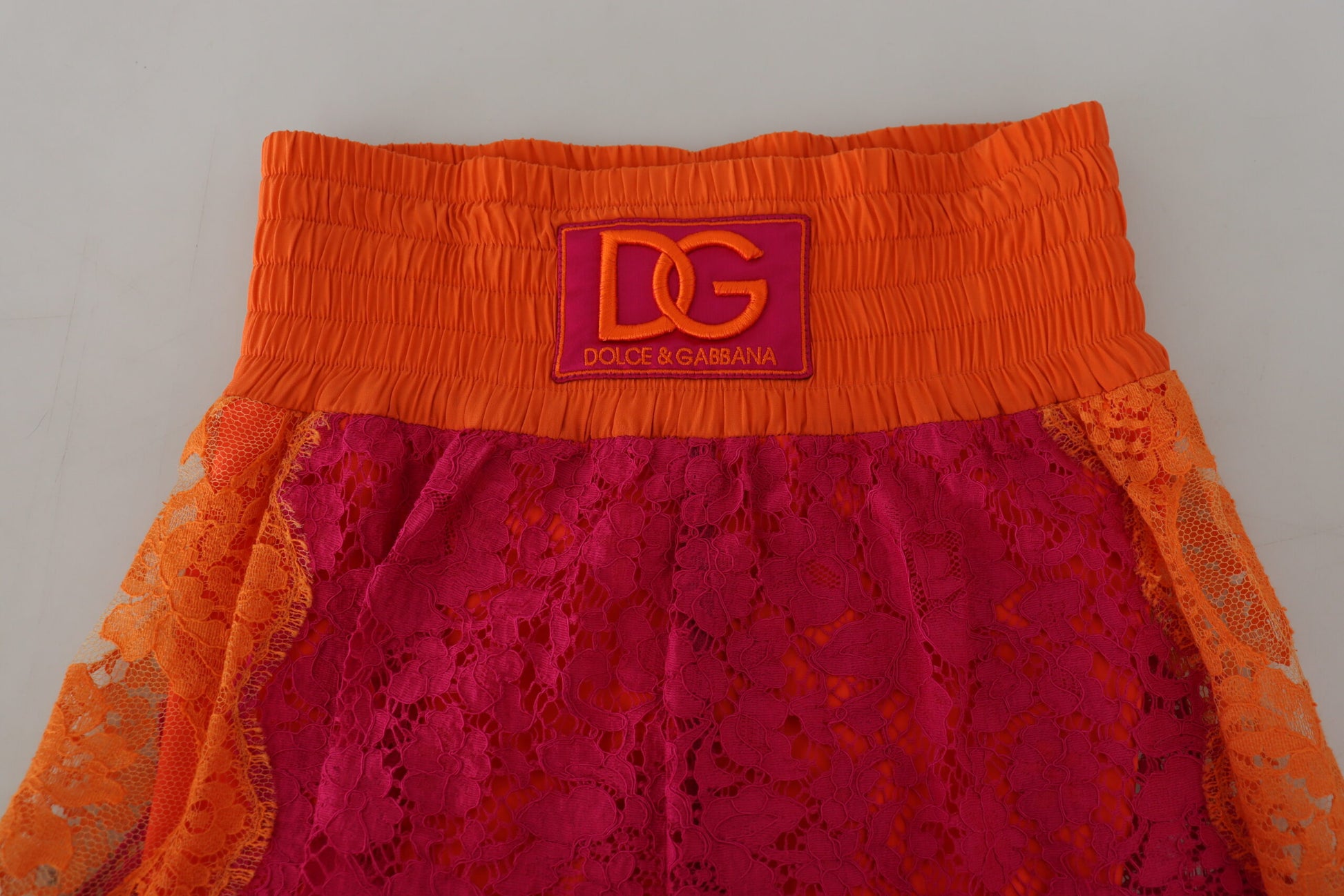 Orange lace boxer shorts with red trim