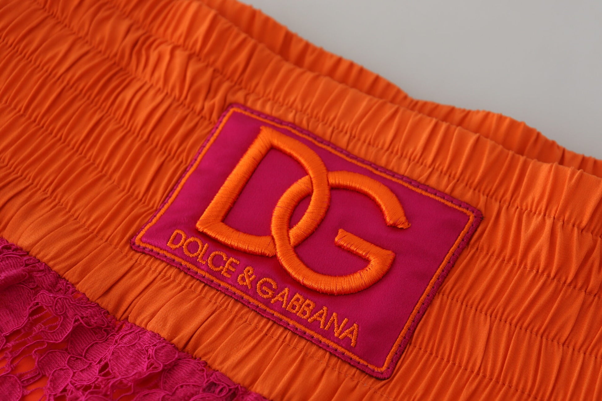 Red lace lingerie with brand logo on waistband