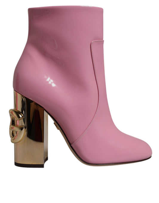 Pink high heel boot with gold accents