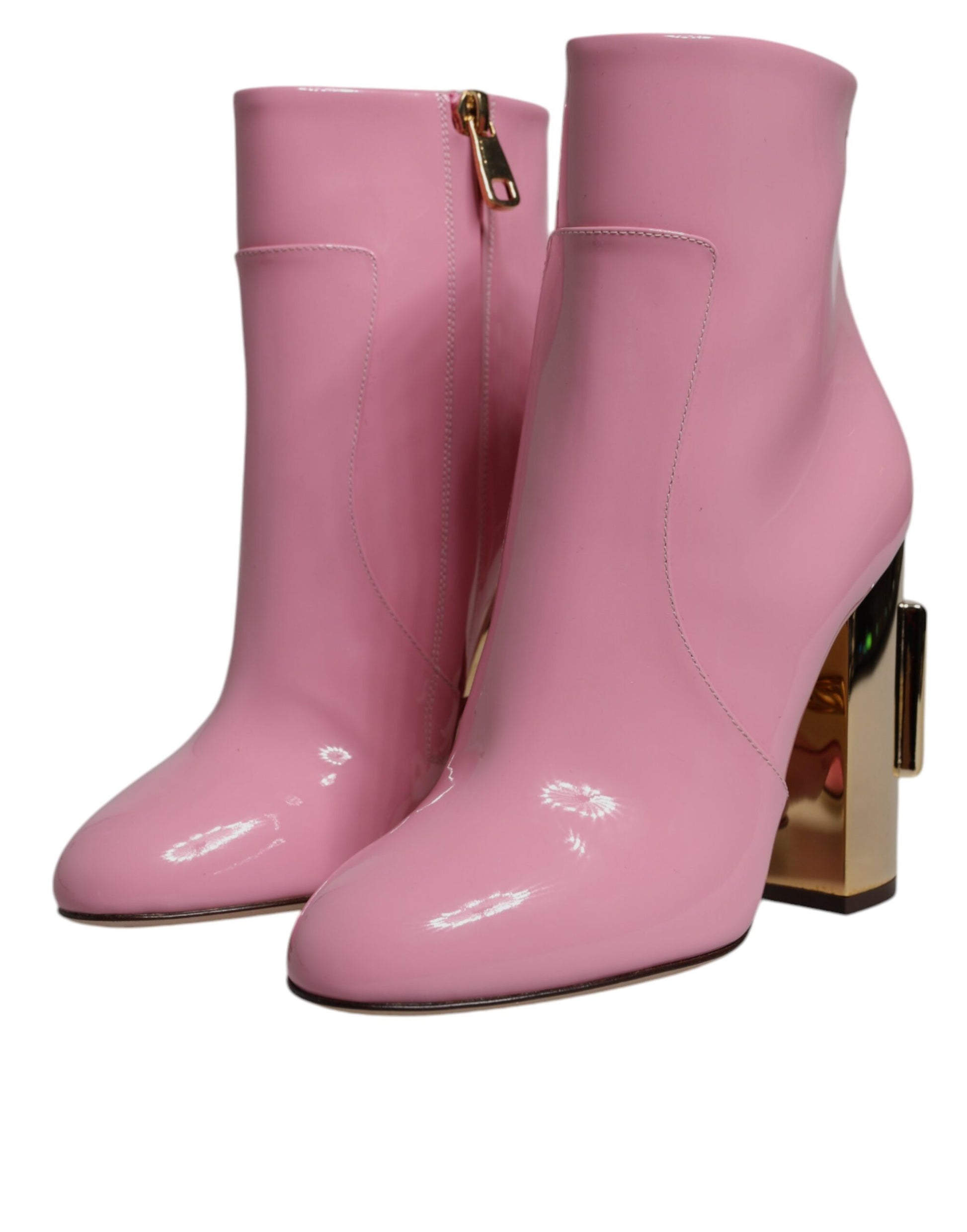 Pair of pink boots with high heels