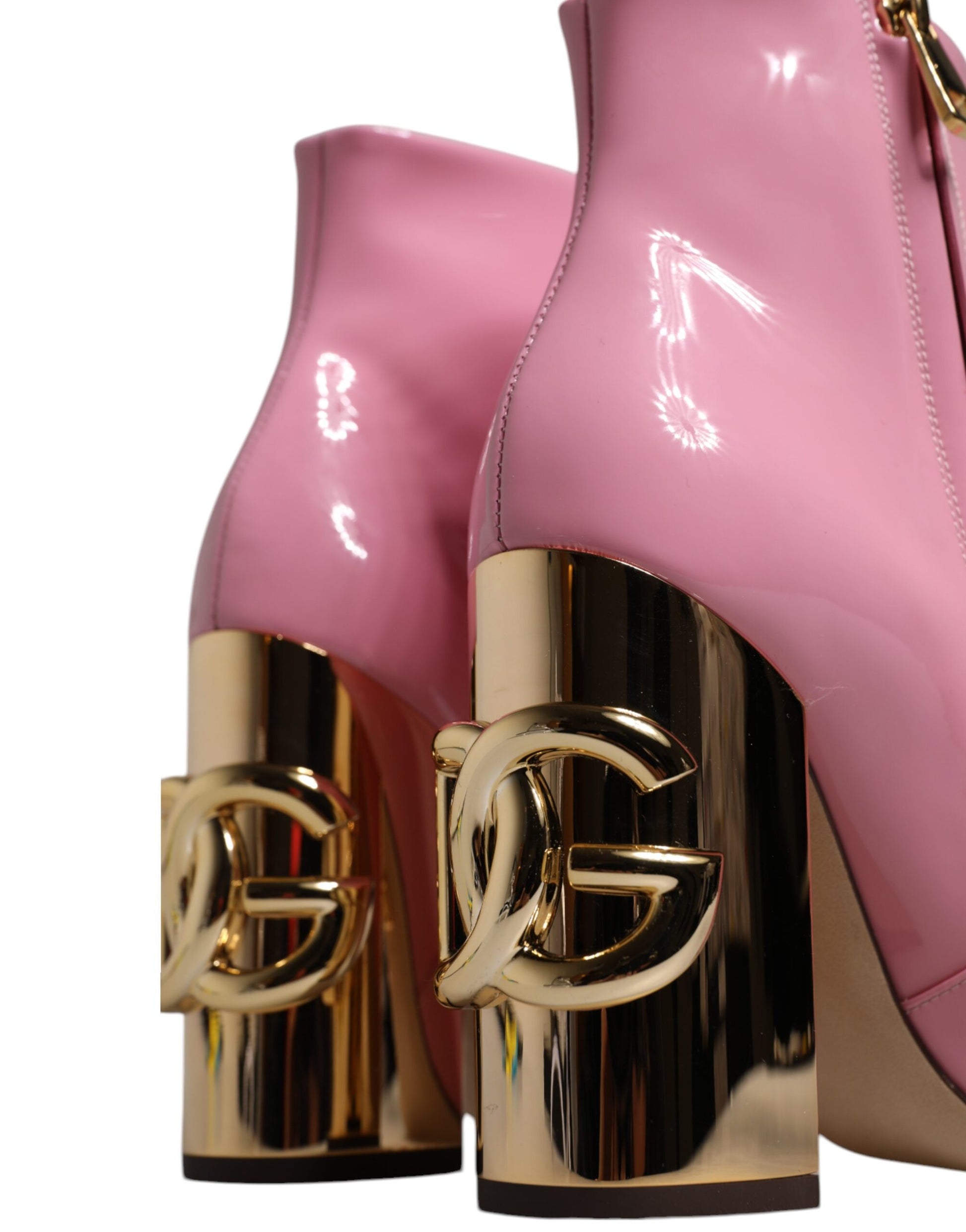 Pair of high heel shoes with gold buckles