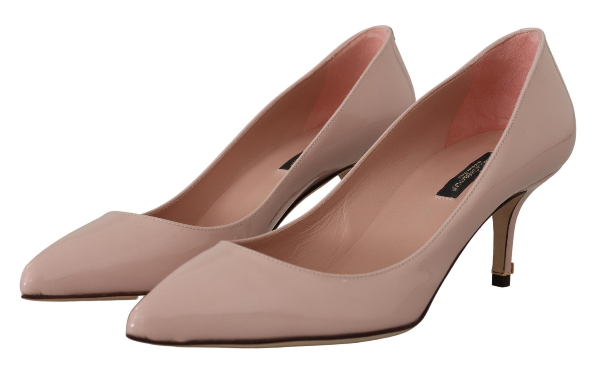 Pair of women's pink high heel shoes with stiletto heels and open toe design