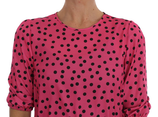 Pink polka dot shirt on a mannequin