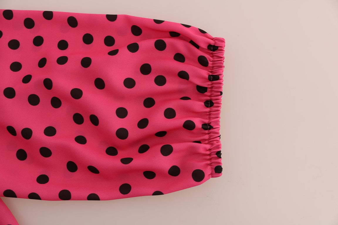 Pink swimsuit with polka dots