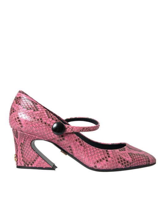 Pink high heel shoes with bow detail and snake skin texture