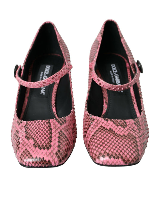 Pair of pink high heel shoes with embellishments and a bow on top