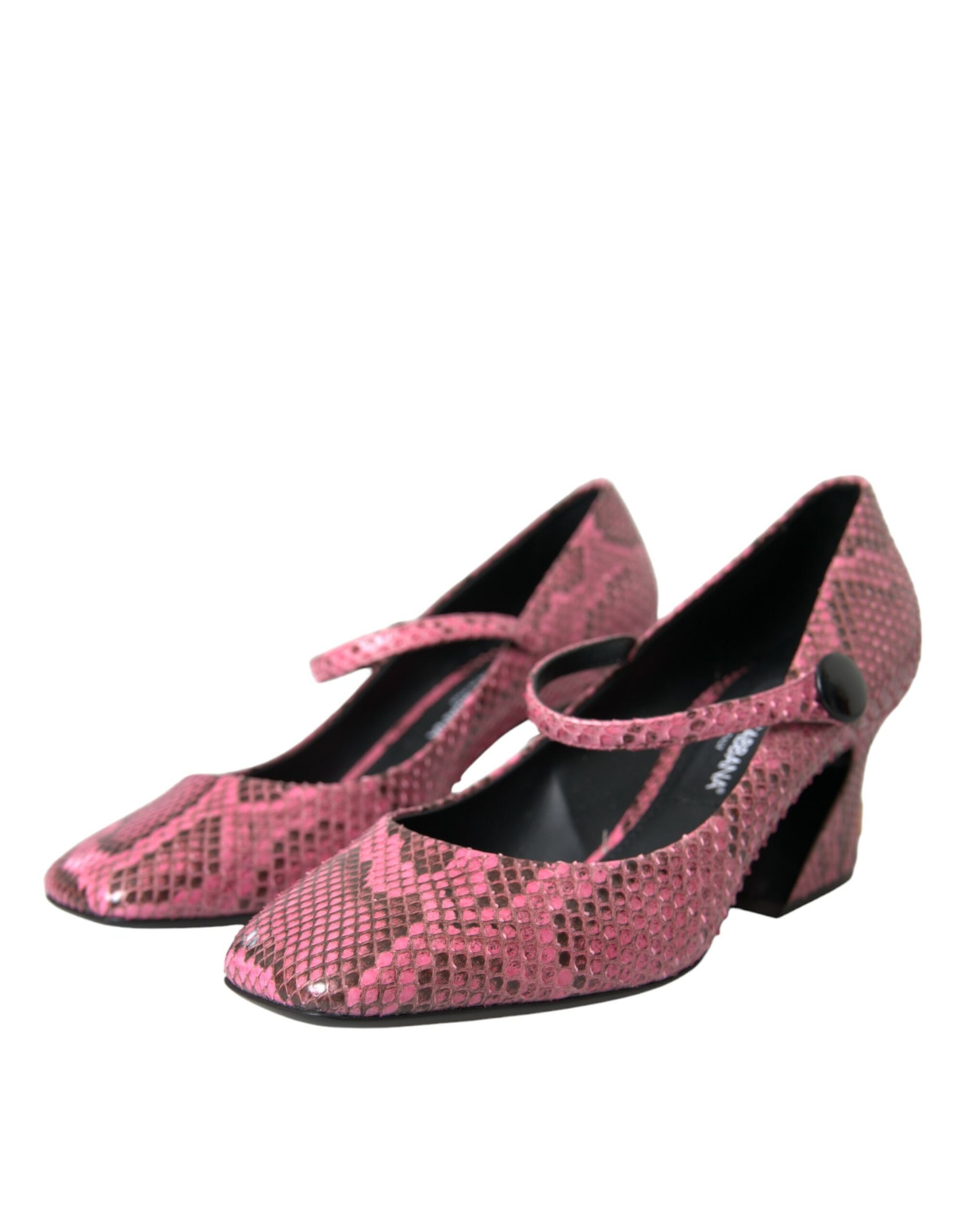 Pair of red high heel shoes with bow detailing