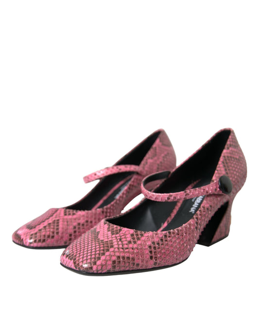 Pair of red high heel shoes with bow detailing
