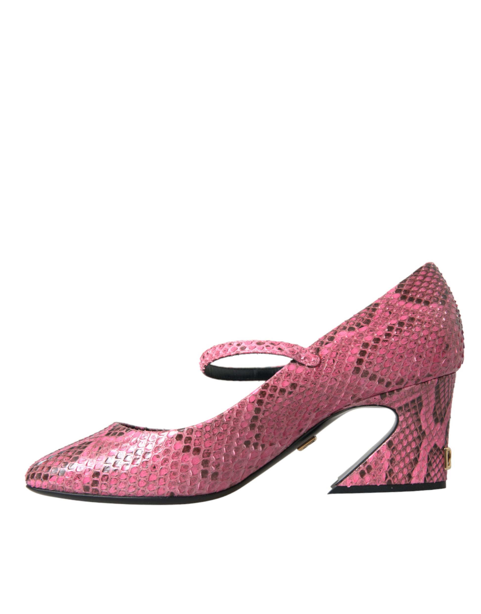 Pink high heel shoe with embossed pattern and gold accents