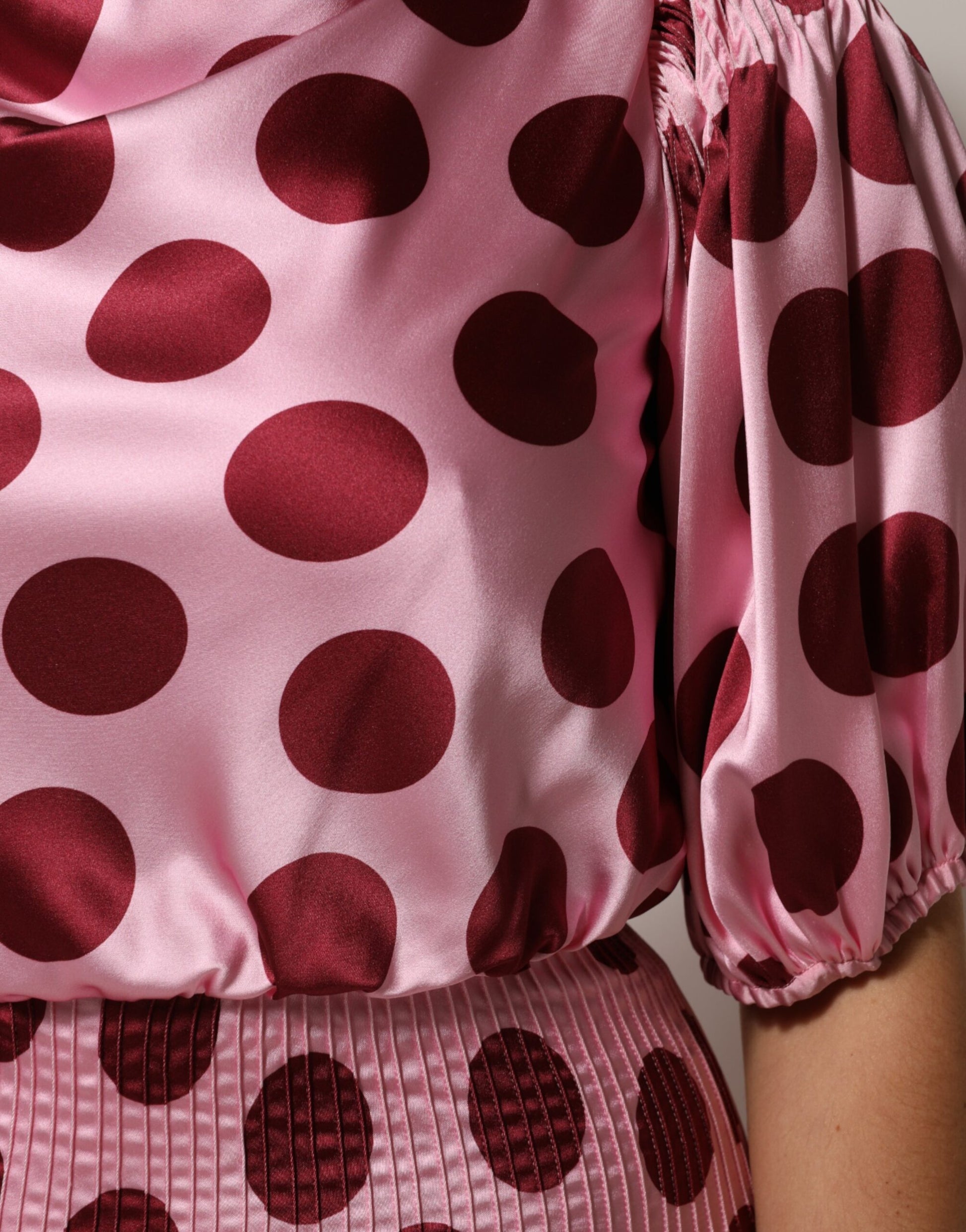 A pink and red polka dot silk satin maxi gown dress