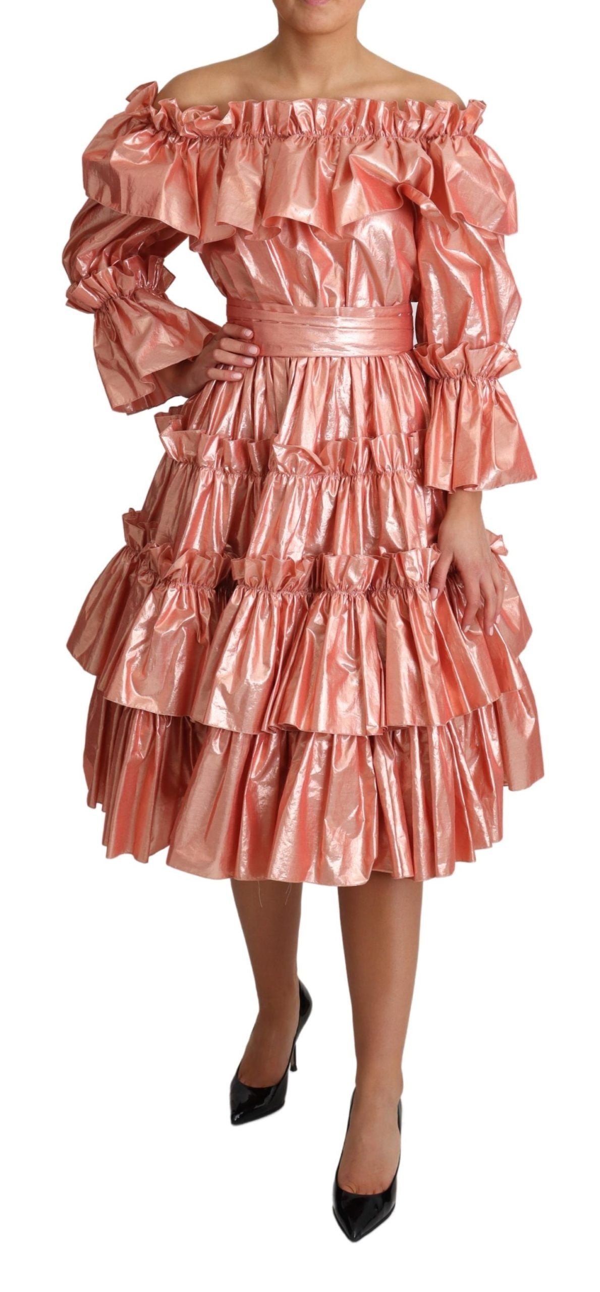 A pink ruffled dress with a silk and cotton blend