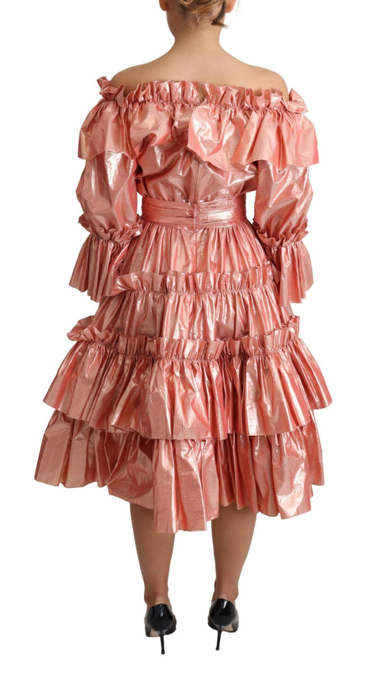 A pink ruffled dress with a silky and cotton blend fabric