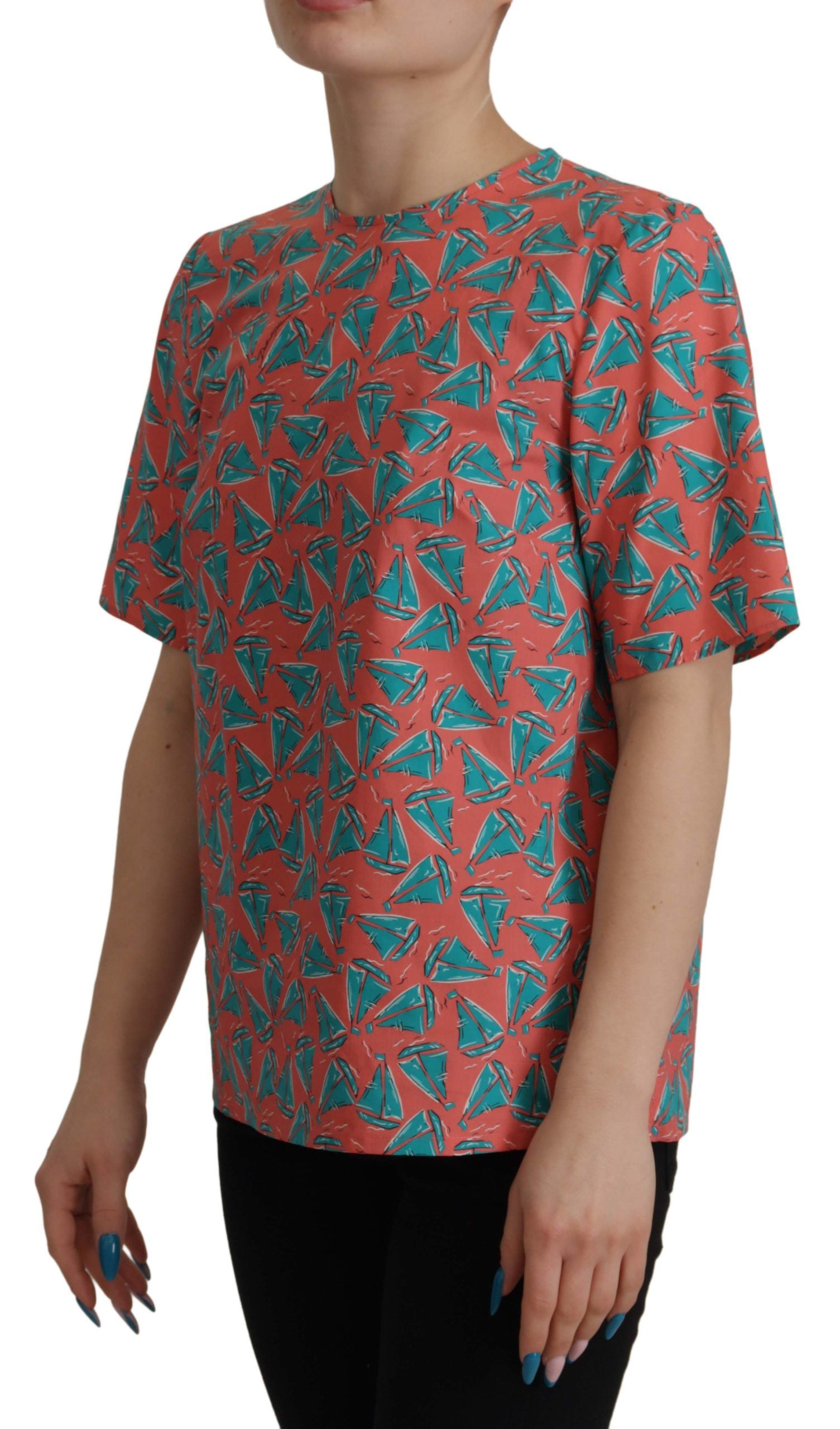 Short sleeved top with colorful pattern featuring birds