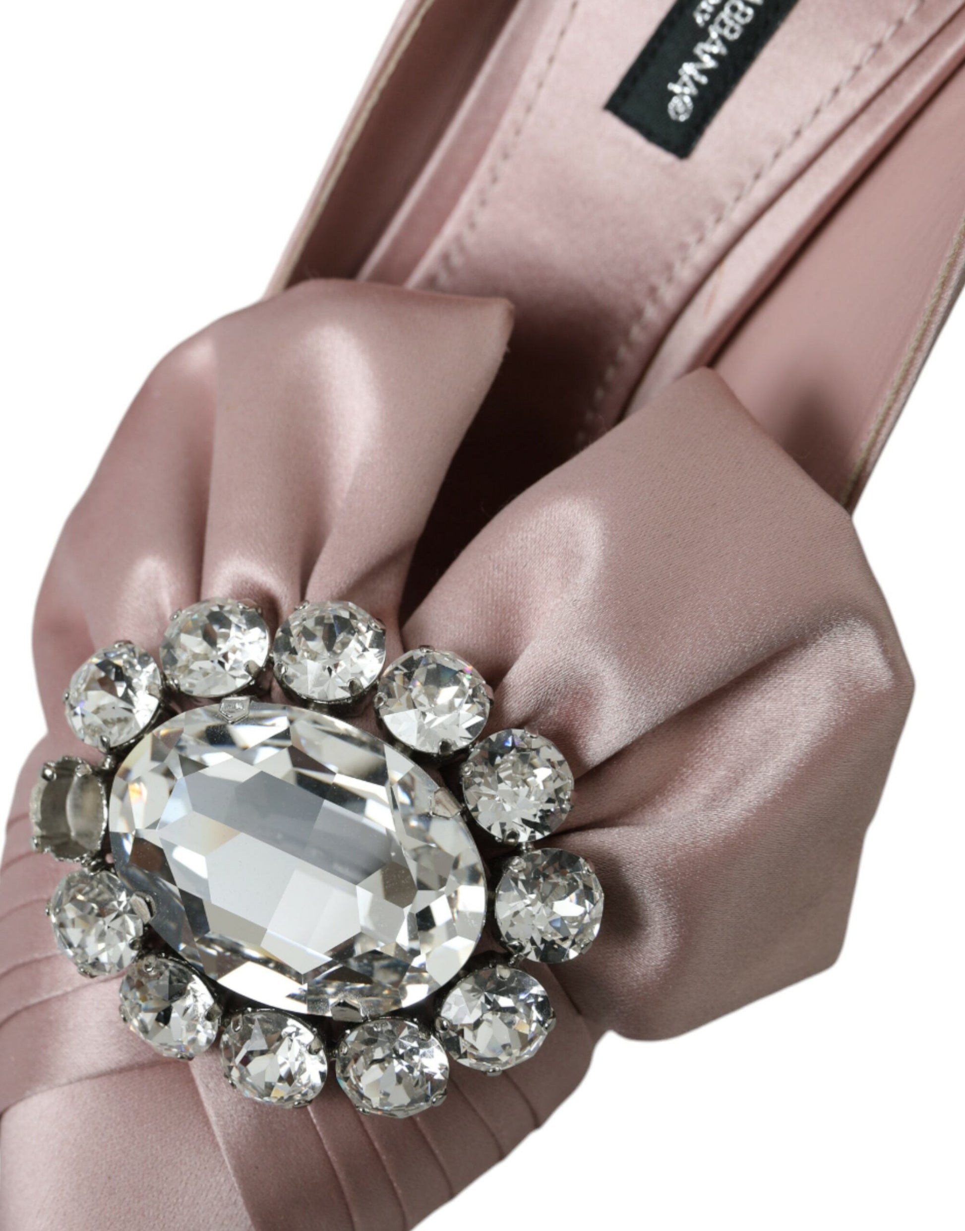 Pink satin shoe with rhinestone bow and heel