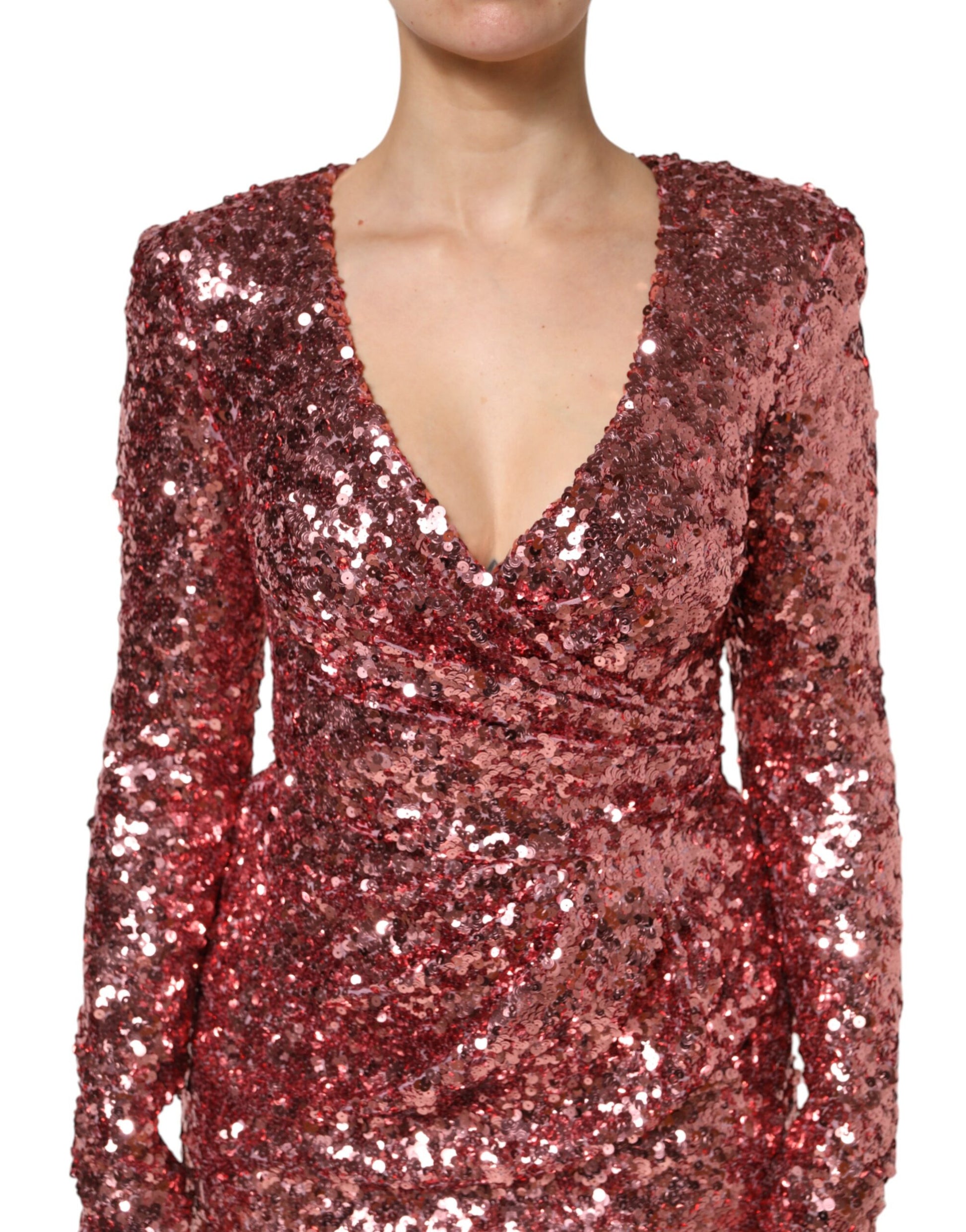 A pink sequin dress with a V-neck and nylon material