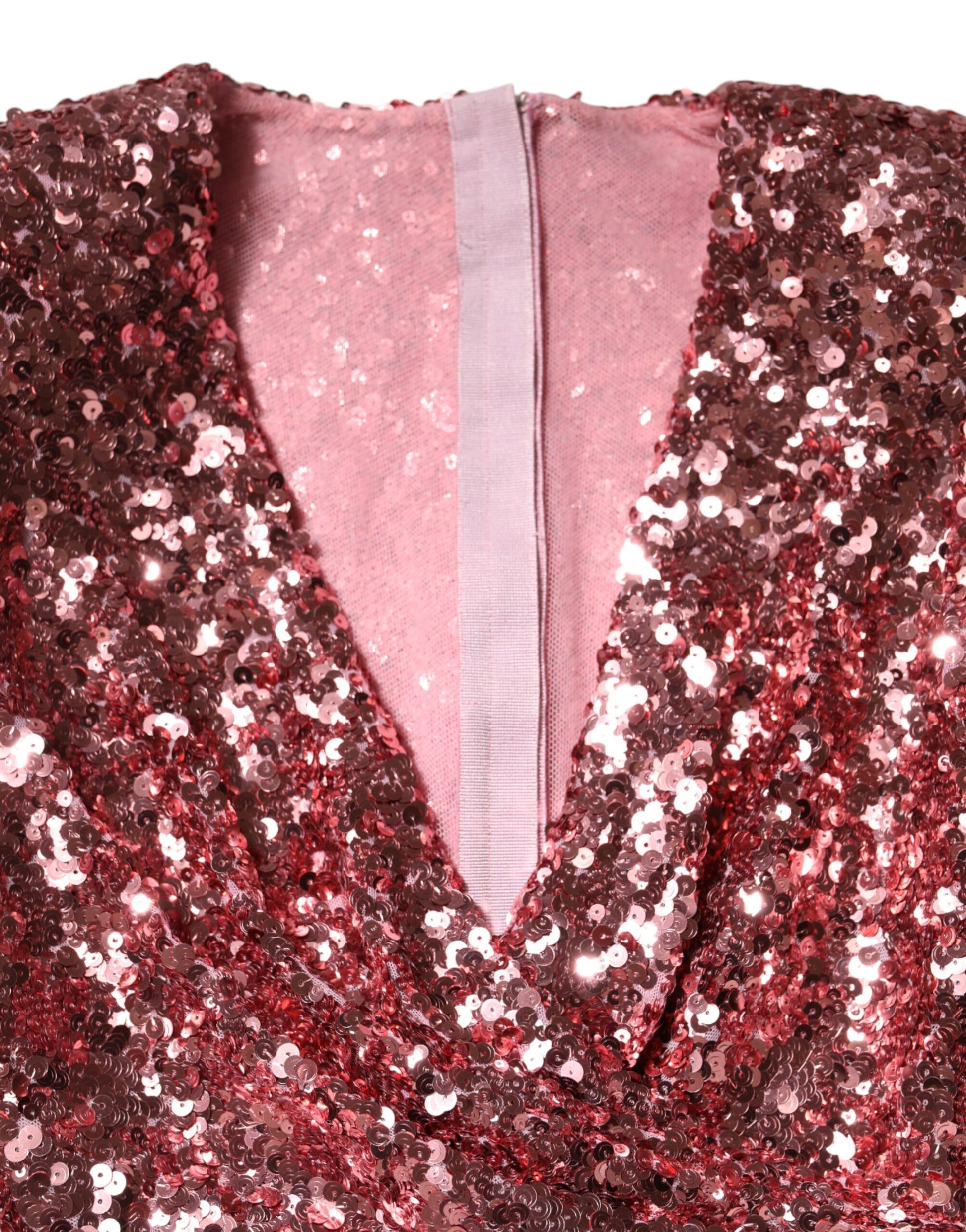 A pink sequin dress with a V-neck and nylon material