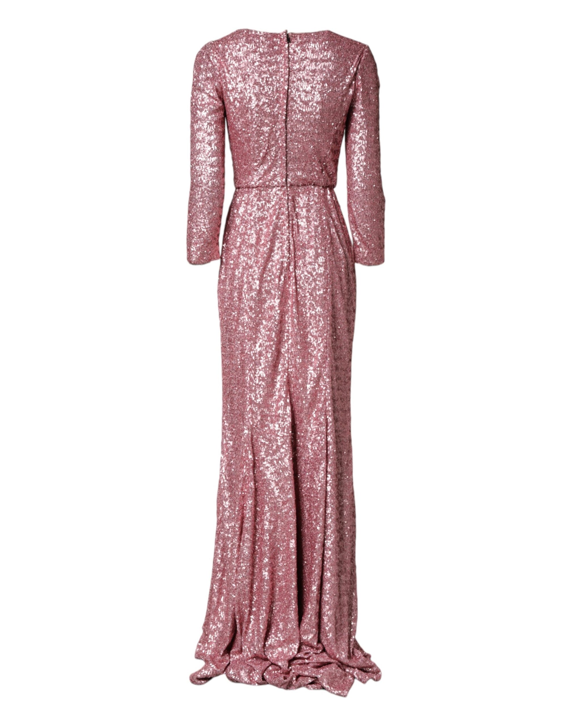 A long pink sequined mermaid gown dress with a high neckline and fitted bodice
