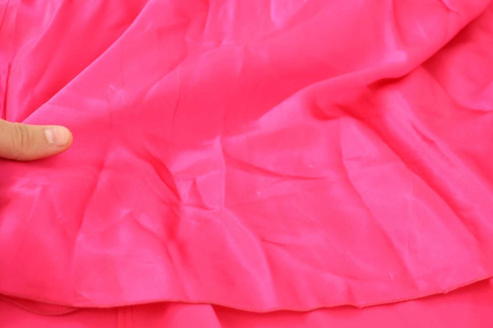 Pink fabric with wrinkles