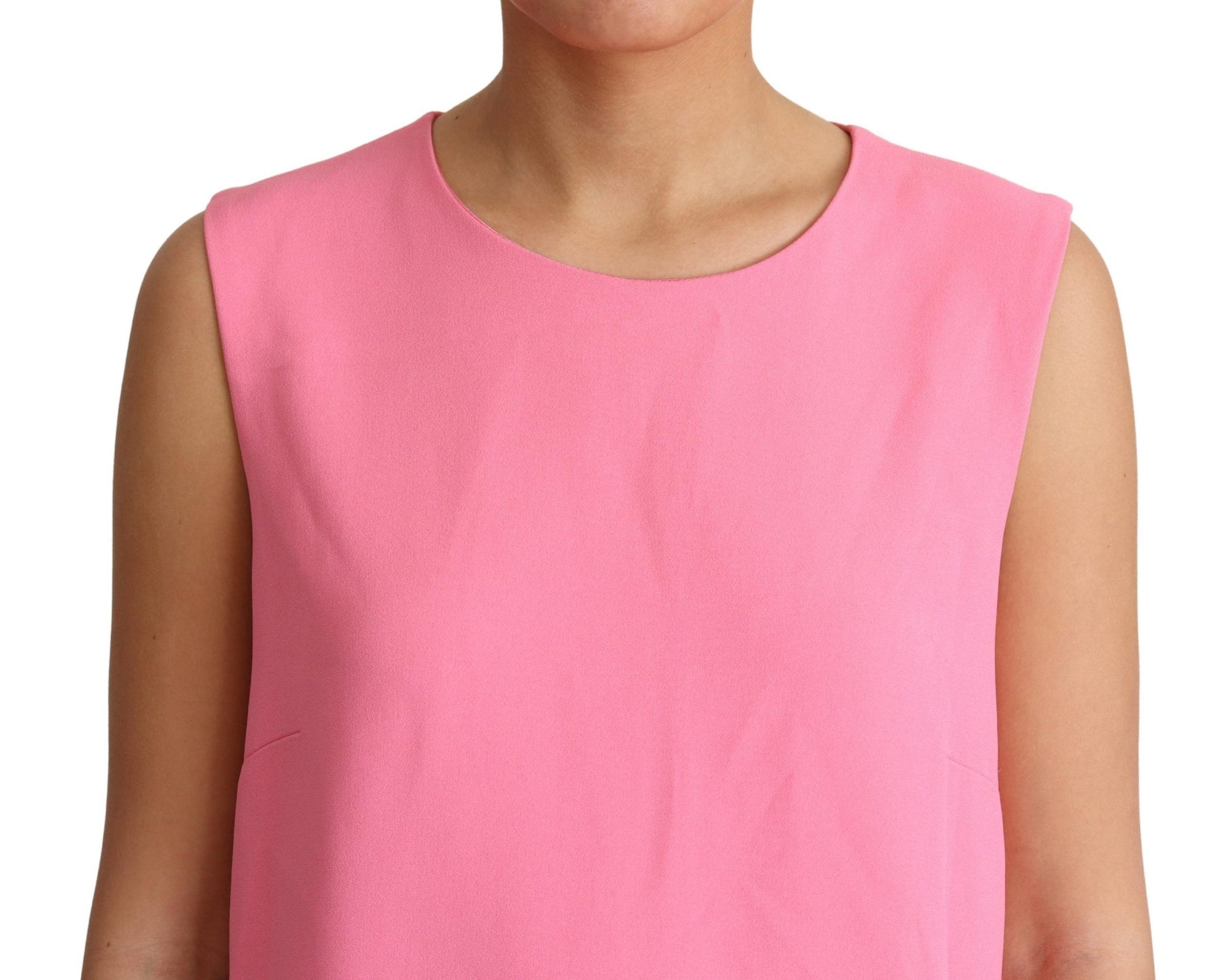 A sleeveless pink dress with a V-neckline