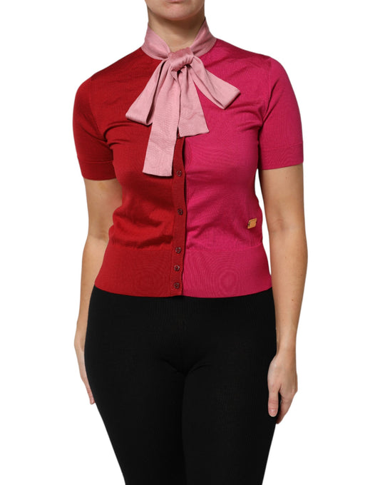 Woman wearing red jacket over black pants