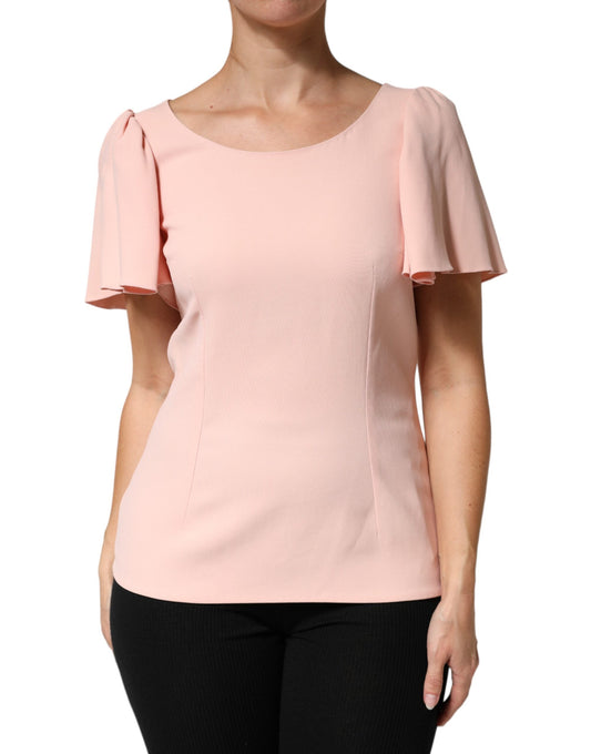 Pink blouse with ruffled sleeves