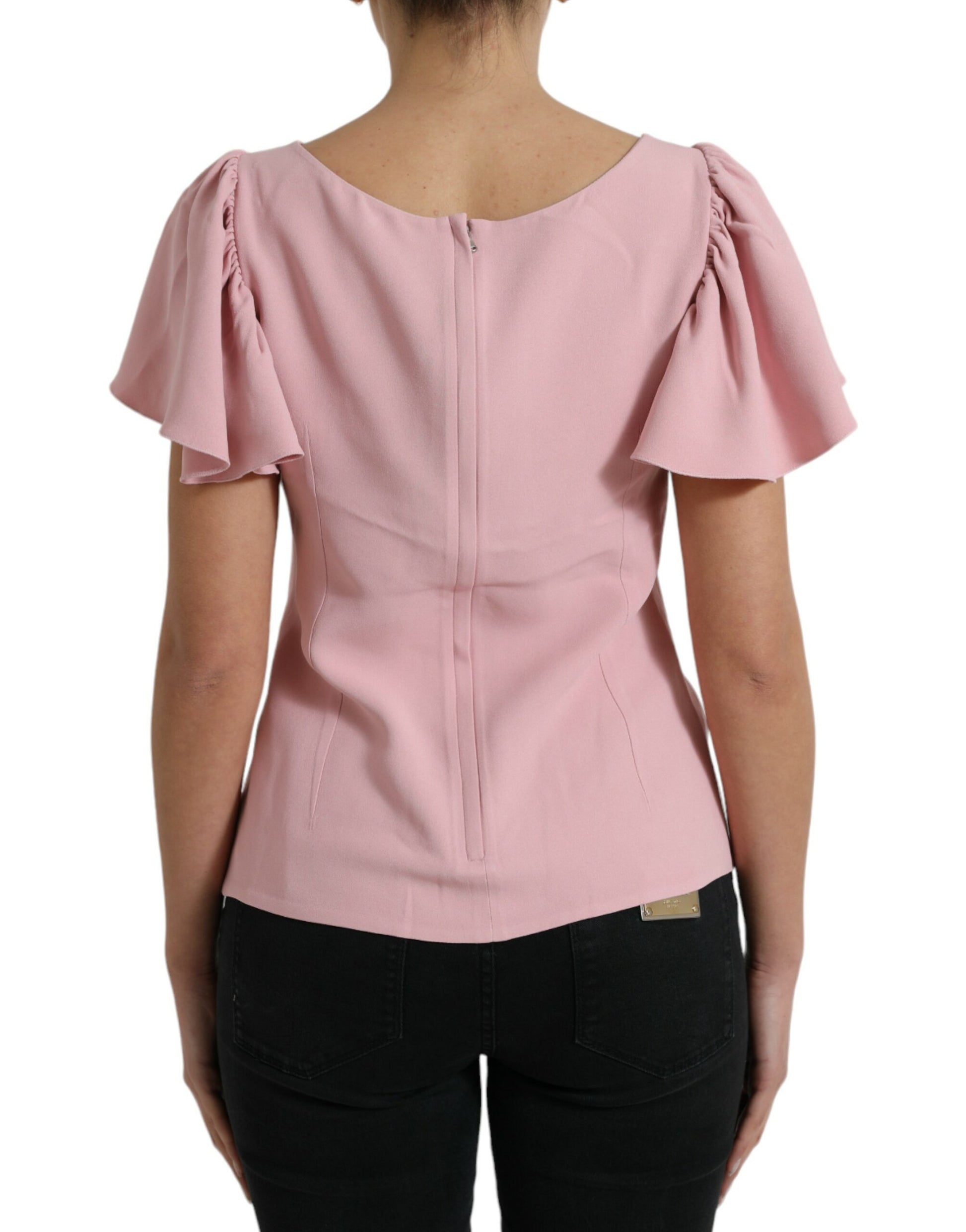 Pink blouse with ruffled sleeves