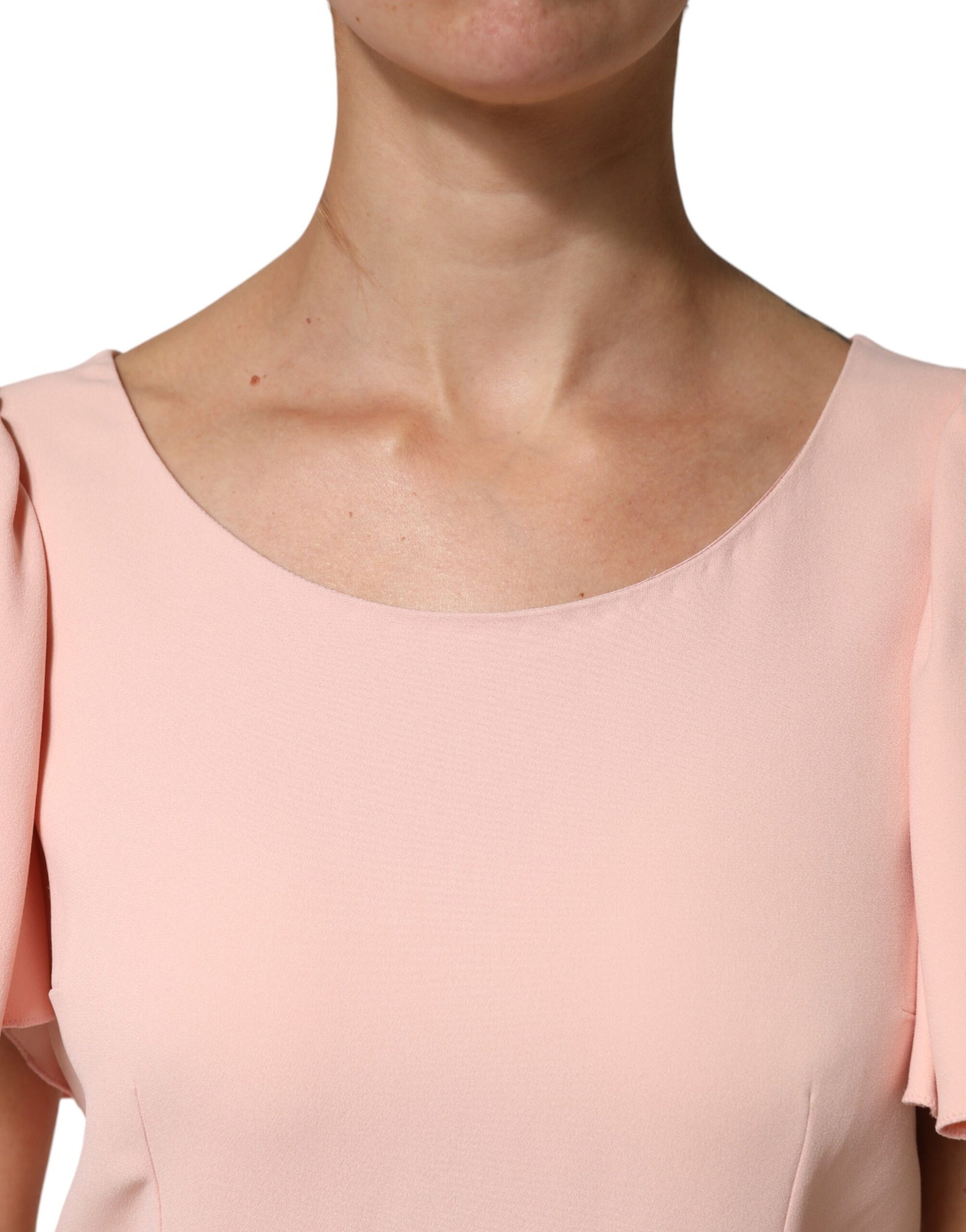 Woman wearing pink top