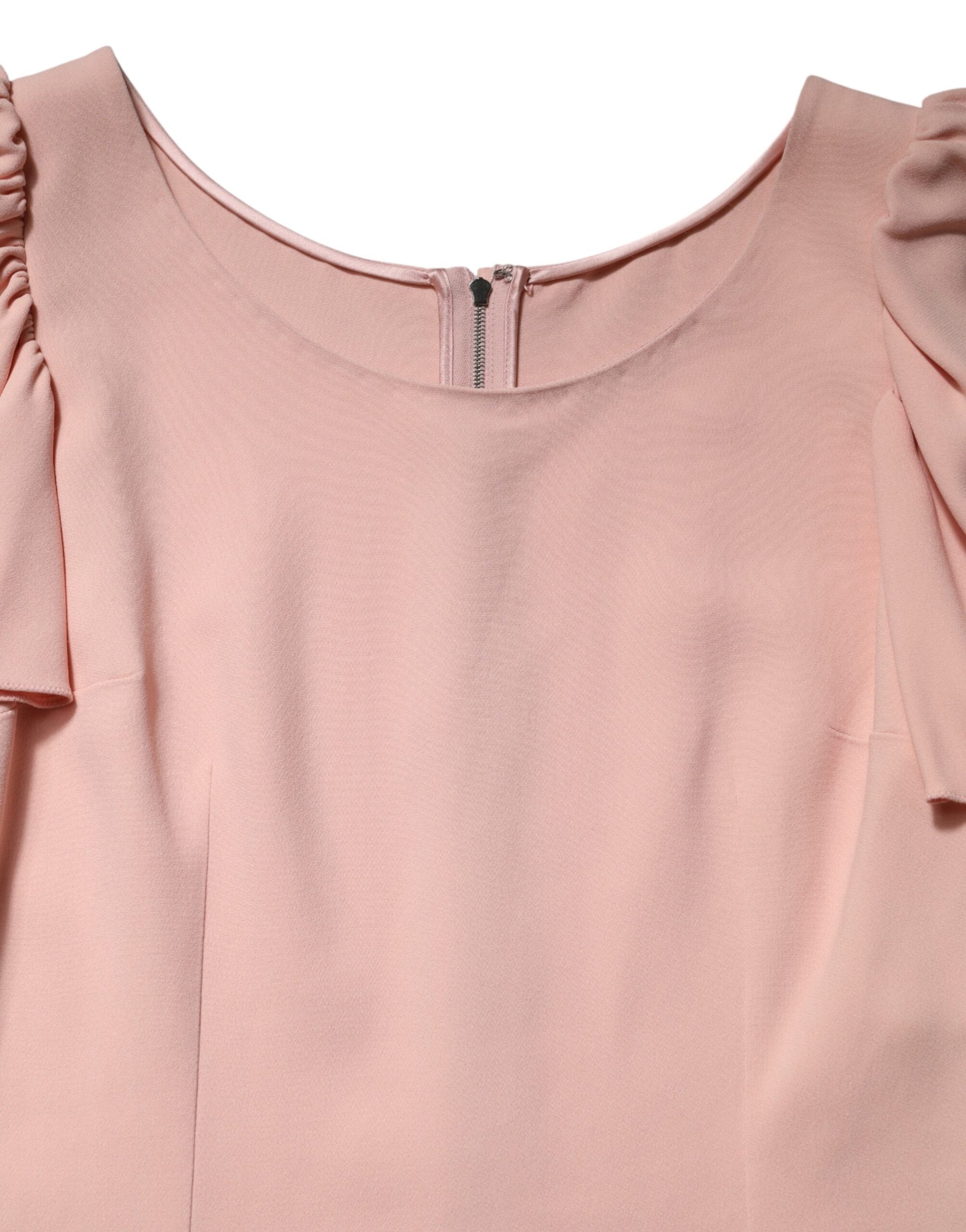 Pink blouse with ruffled sleeves