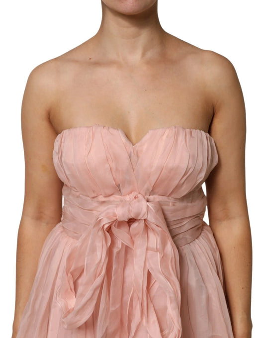 Pink silk chiffon midi dress with pleats and ruffled waist