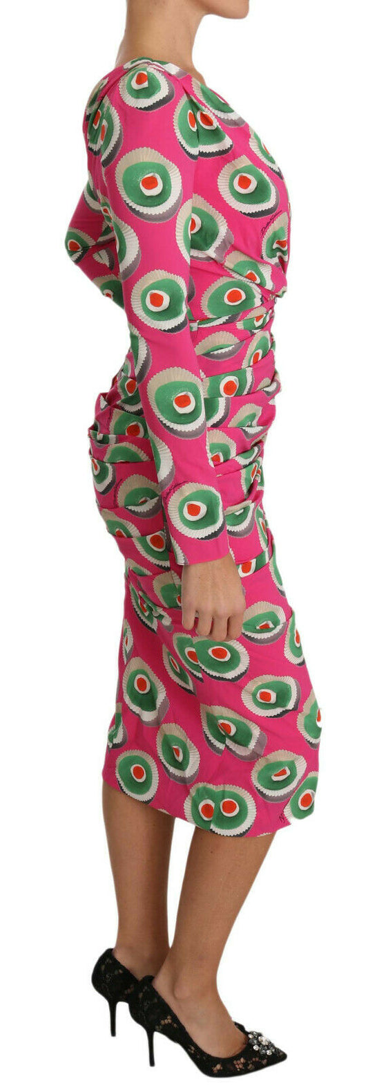 A pink silk dress with a cupcake print and stretchy material