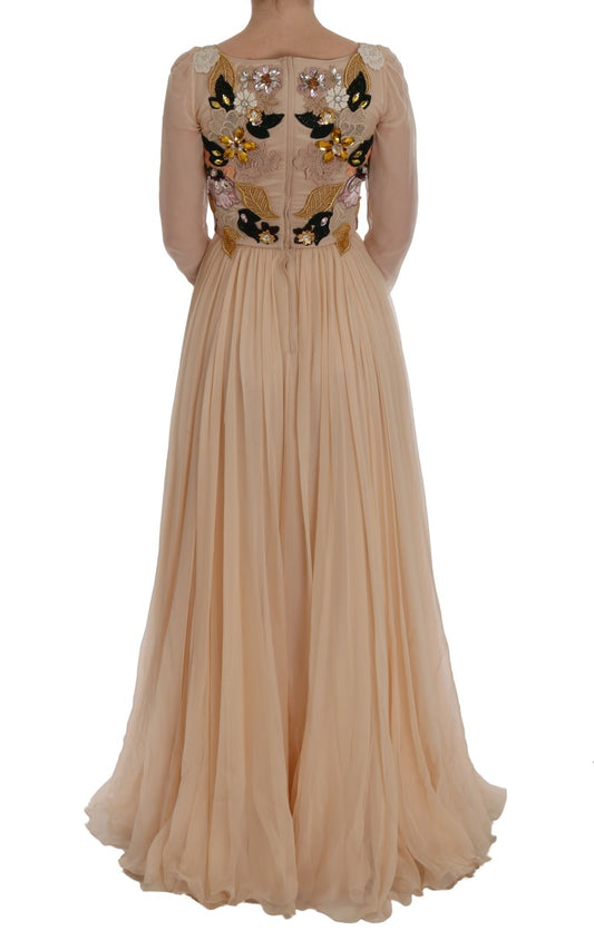 Long beige bridal dress with ruffles and embroidery on back