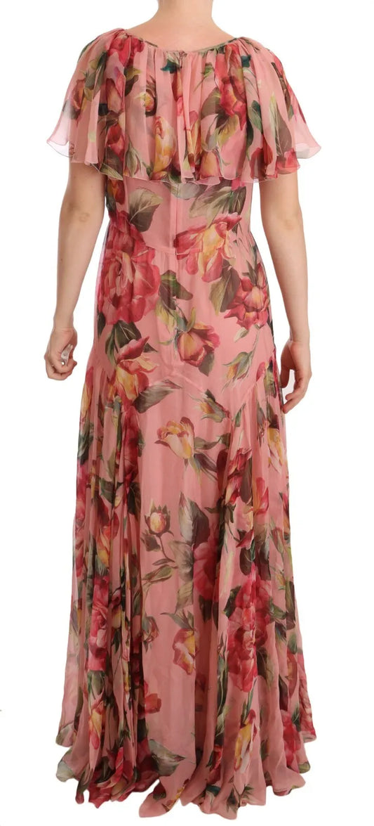 A long pink floral print dress with layered ruffles and a flowing silhouette