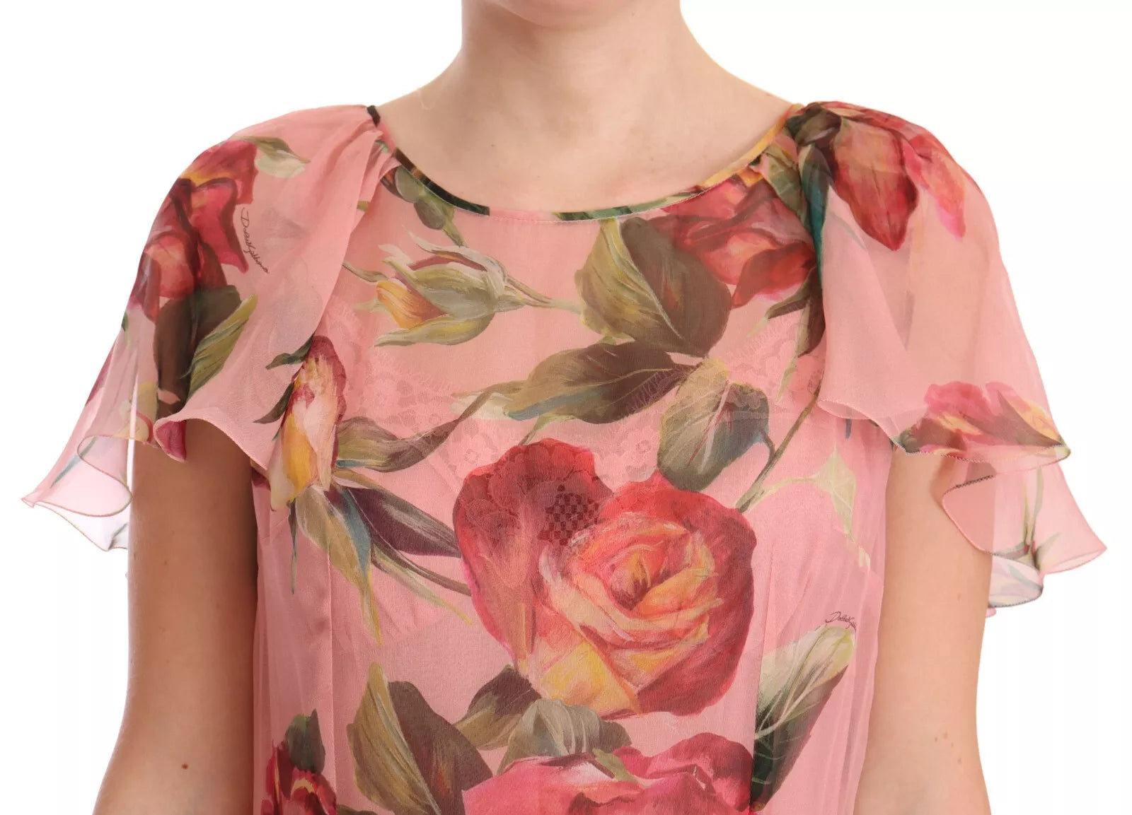 A pink floral print maxi dress with layered ruffles and a silky texture