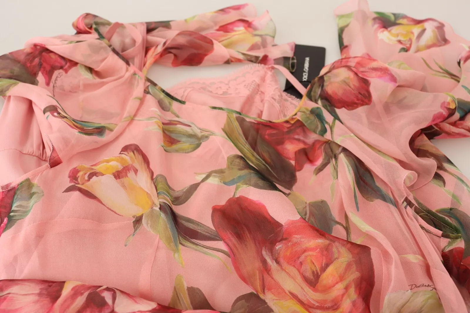 A pink floral print maxi dress with layered design