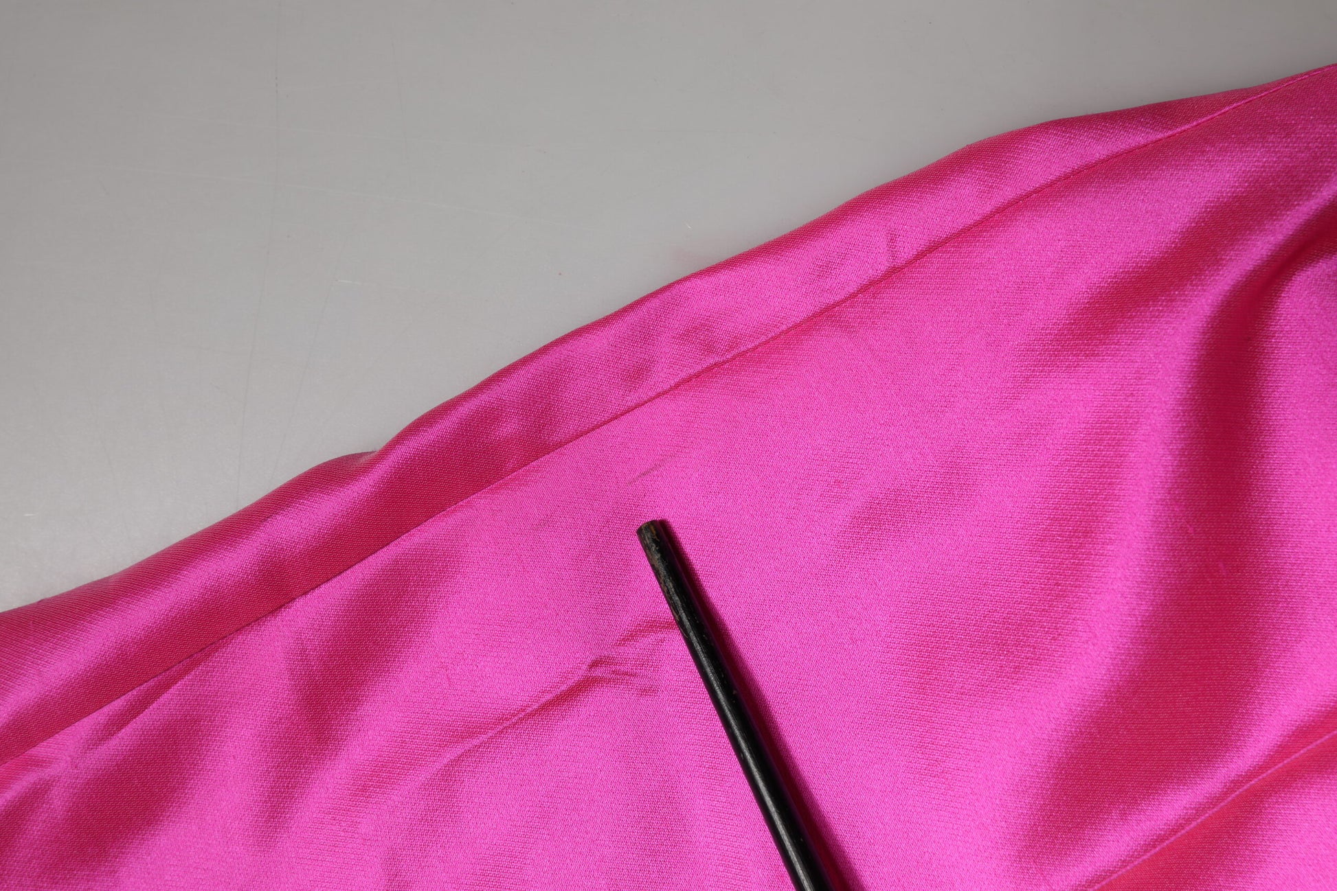A pair of pink silk high waist trousers from Dolce & Gabbana