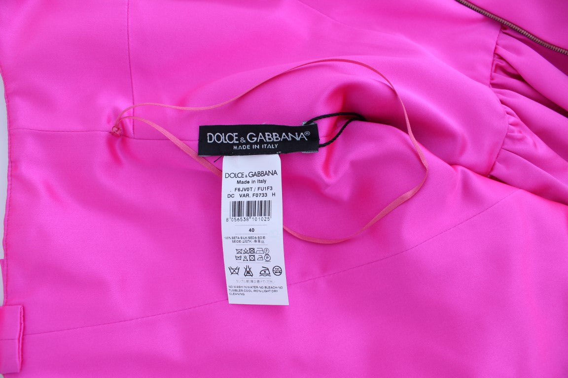 Pink garment with tag on sleeve