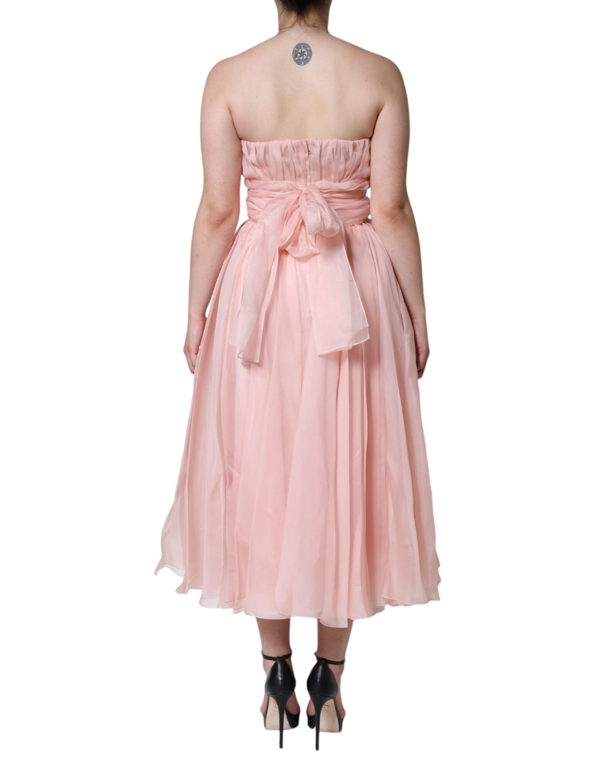 Pink silk strapless maxi dress with ruffled hem