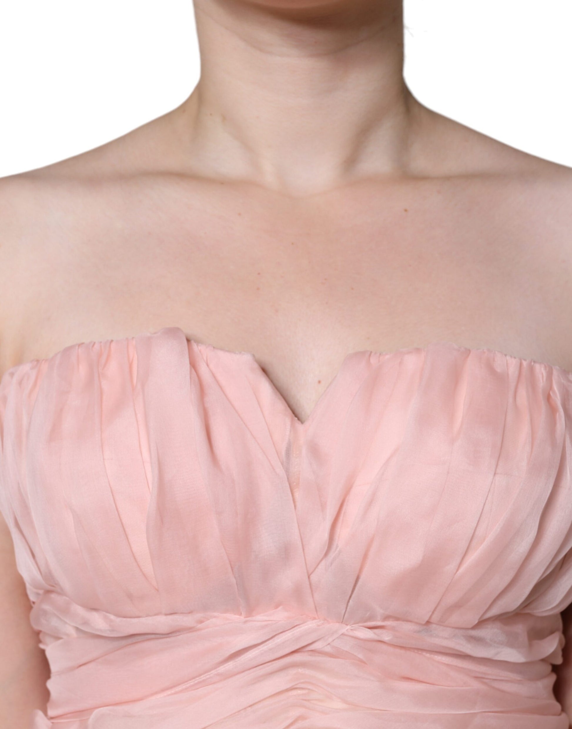 Pink strapless maxi dress with ruched bodice and pleated skirt