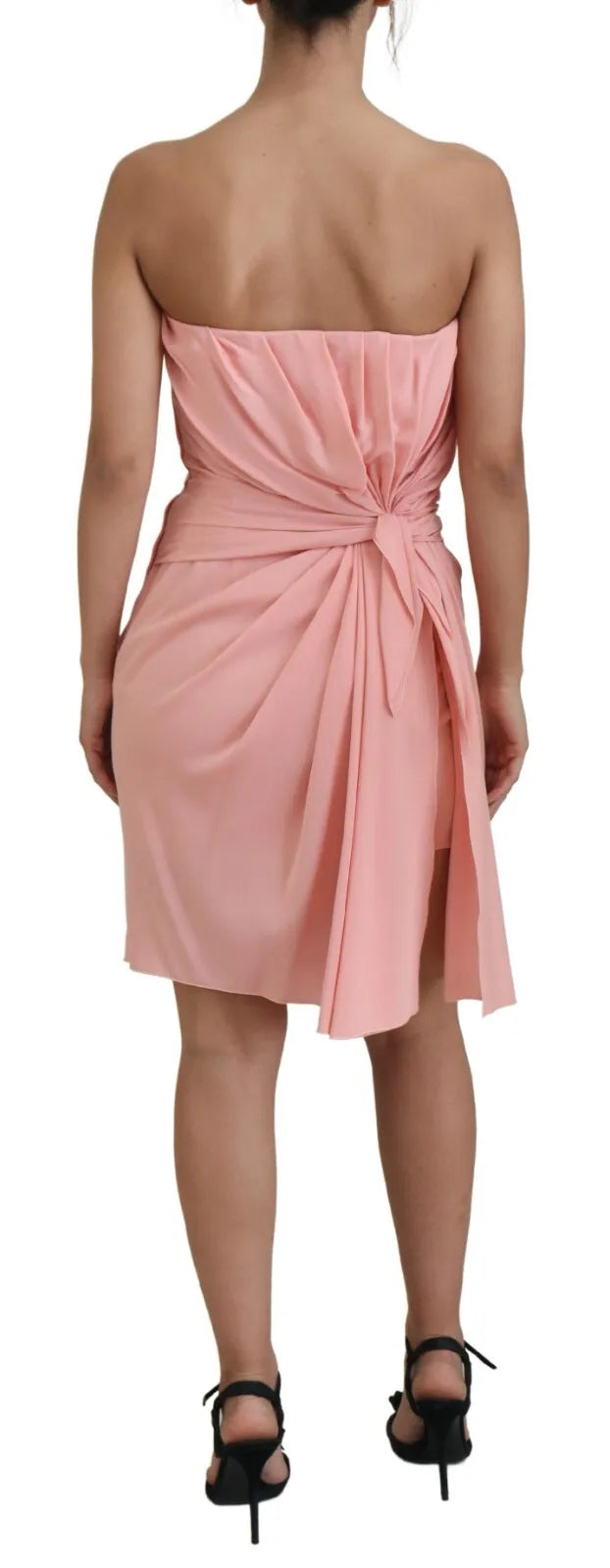 A pink strapless sheath dress with a ruched waist and skirt