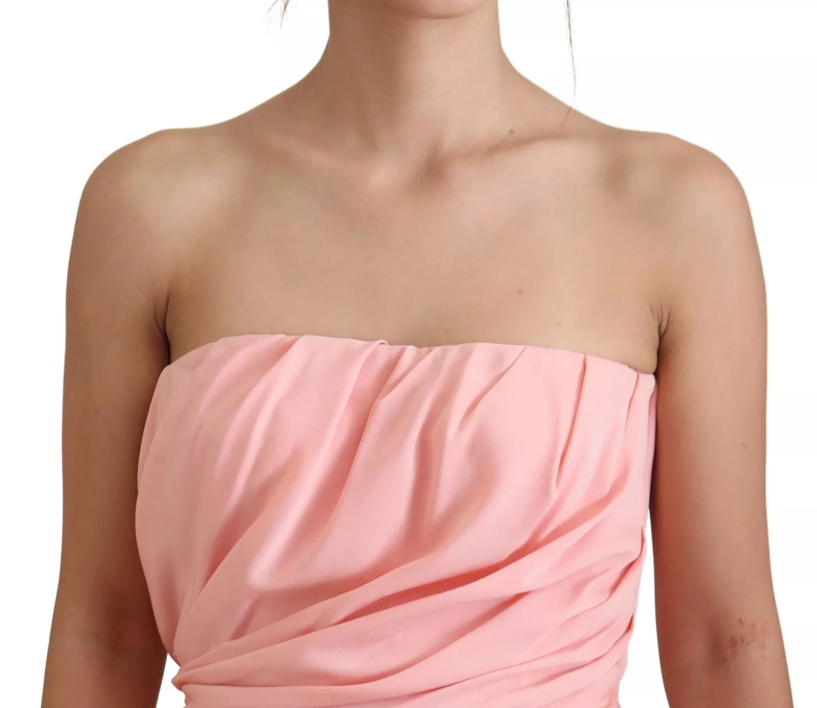 A pink strapless sheath dress with a stretchy silky fabric