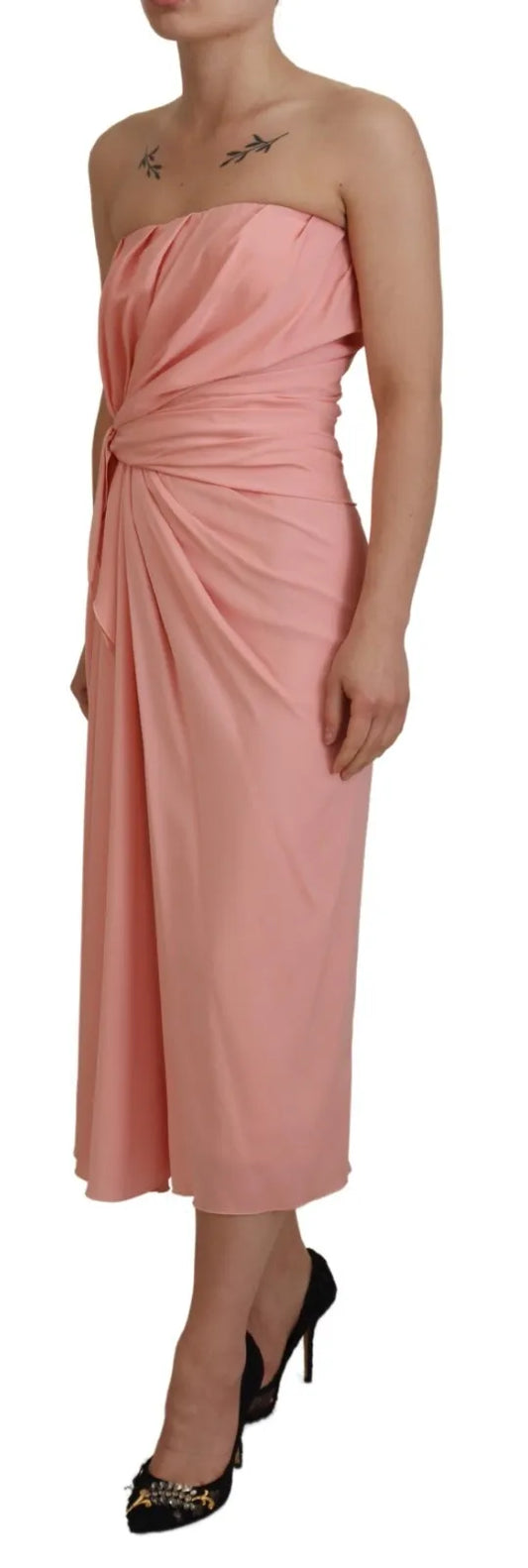A pink strapless sheath dress with a stretchy silky fabric