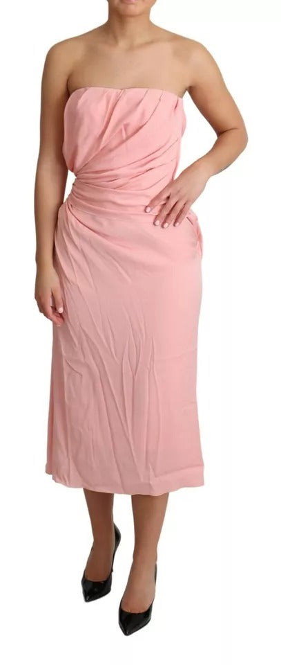 A pink silk strapless sheath midi dress with stretch