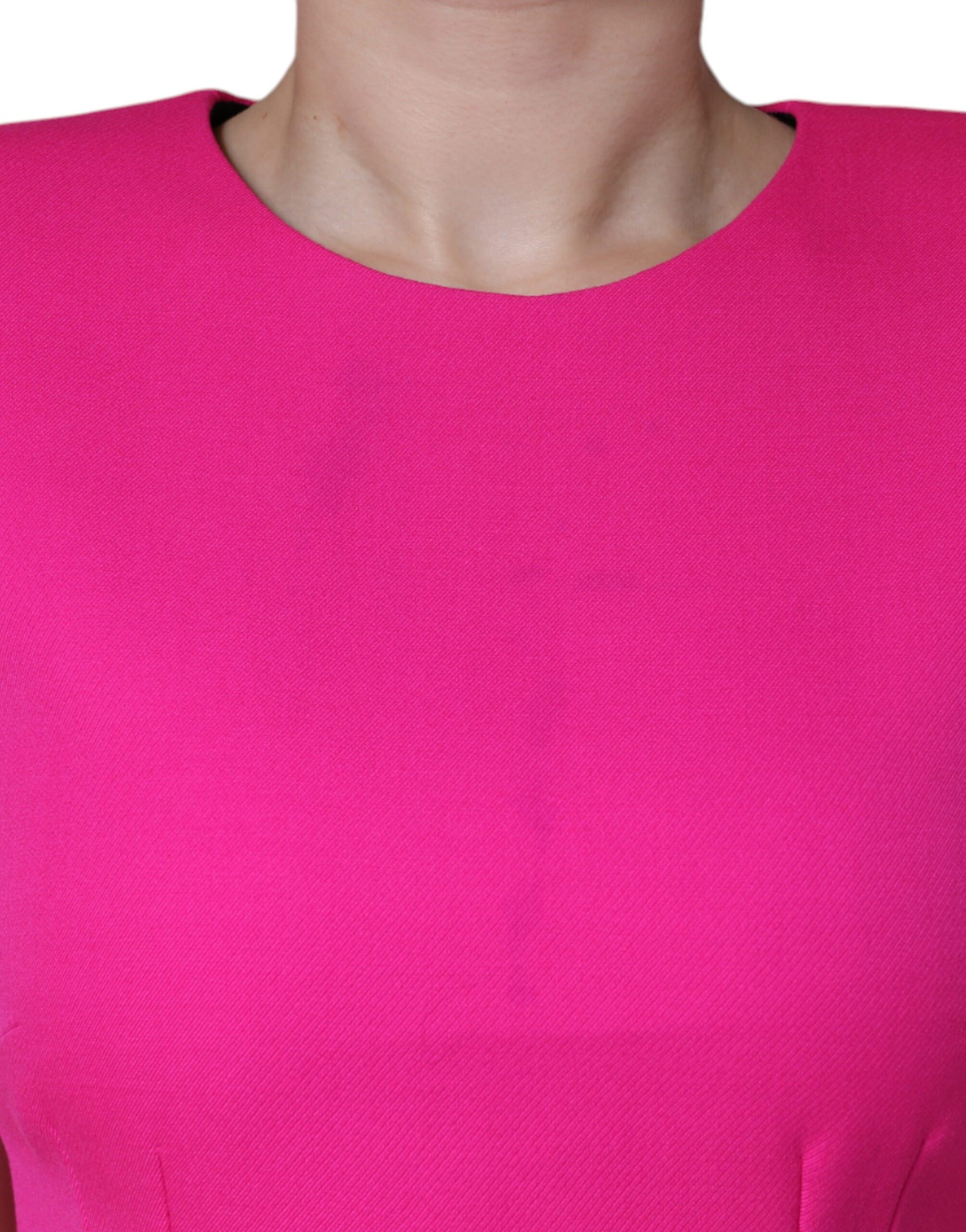 Pink sleeveless bodycon dress with A-line silhouette
